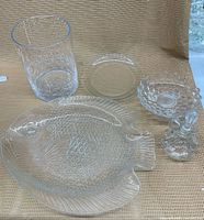 Group shot of five clear glass items
