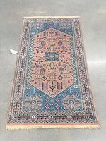 Full view of the Persian rug showing overall pattern and size