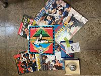 Group of six Blue Jays commemorative publications laid out on floor