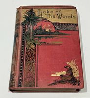 Front cover showing ornate gilt and black design