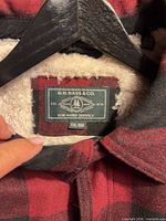 Brand label showing G.H. Bass & Co., size XXL, sherpa lining