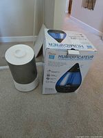 Crane humidifier box and Homvana cylindrical humidifier side by side