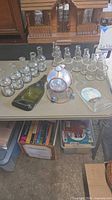 Full lot on table showing all glass and metal items