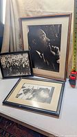 All three framed photographs grouped together