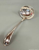 Top view of sterling silver gravy ladle