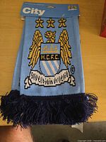 Front view showing crest, colors, header card