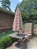 Table folded umbrella closed view