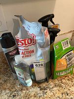 Complete group of cleaning items on countertop