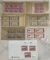 Overview of all stamp plate blocks and singles on surface
