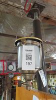 Full view of lantern hanging by bail handle