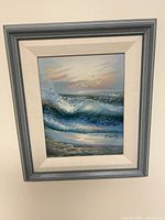Framed H. Garley seascape oil painting, gray frame visible