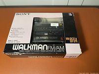 Front of retail box showing WM-BF64 through clear window