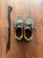 Top view of shoes with extra black shoelaces