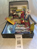 Box of sealed lures showing quantity and variety