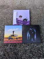 All three canvas prints laid out on ground