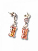 front view of both earrings showing amber and silver design