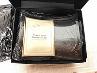 Frame in original box with protective plastic