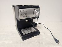 Front view of Hamilton Beach espresso machine with portafilter attached