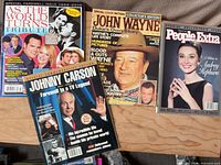 Front covers of all four collector magazines