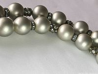 Close-up of pearls and rhinestone rondelles