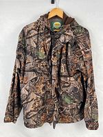 Front view showing camo pattern, pockets, zip and snap closure, hood