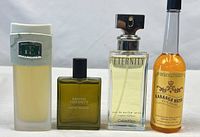 Group shot of all four fragrance bottles