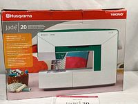 Retail box front showing Husqvarna Viking branding and image of Jade 20 machine
