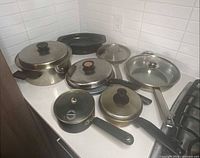 Group view showing all cookware pieces on countertop