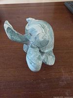 Top view of resin sea turtle figurine showing marbled finish and flipper detail