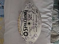 Spalding football side with inflation info and many signatures