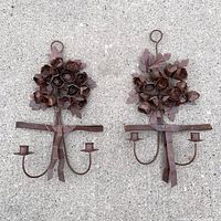 Pair of matching wrought iron floral wall sconces