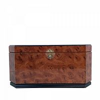 Front view of Powell burl veneer jewelry box showing brass latch, burl pattern, black trim