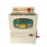 Front view showing Reliable Automatic Dishwasher label, window, internal dishes