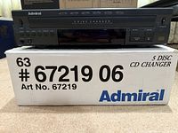 Front view of Admiral 5-disc CD changer on top of original box