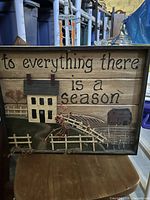 Front view of wooden plaque showing quote and farmhouse artwork