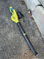 Full view of Radley cordless leaf blower with battery and charger