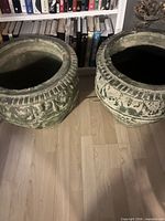 Top view of both urns showing matching size and patina