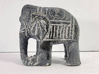 front left view of soapstone elephant showing head and body details