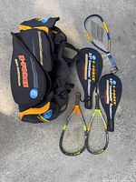 Overall lot: three racquets, bag, two covers