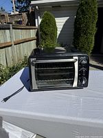 Front view of Bravetti toaster oven, power cord visible