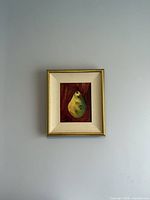 Framed painting on wall showing scale and full view