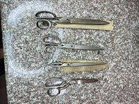 All four shears laid out showing size and general condition