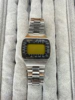 Front view of Seiko digital world time watch showing LCD display and bezel