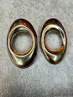 Front view of both large oval sterling silver earrings
