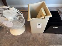 Utilitech fan, beige tote, black file sorter