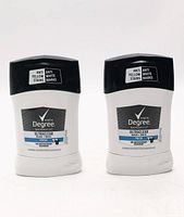 Front view of both deodorant sticks showing brand, scent and anti-stain claims