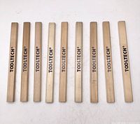 Nine Tooltech carpenter’s pencils aligned
