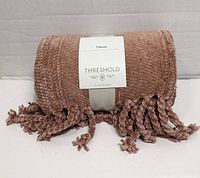 Rolled Threshold throw blanket front view with label