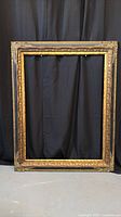 Front view of entire ornate frame showing finish and proportions