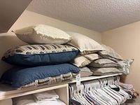Stacked pillows showing blue and geometric designs